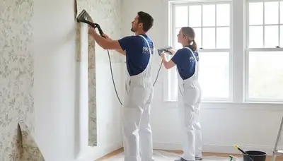 Professional wallpaper removal in Burlington VT by expert house painters prepping interior walls